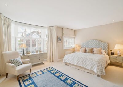 Primary bedroom with double windows